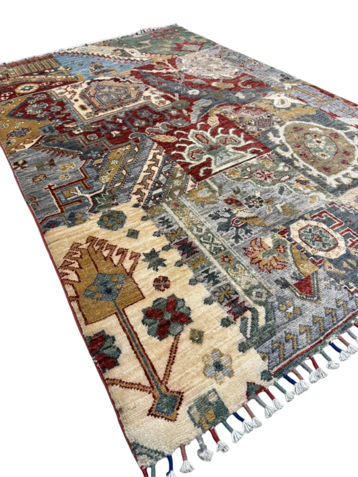 A colorful Kazak Extra rug showcasing traditional tribal designs in a captivating palette.