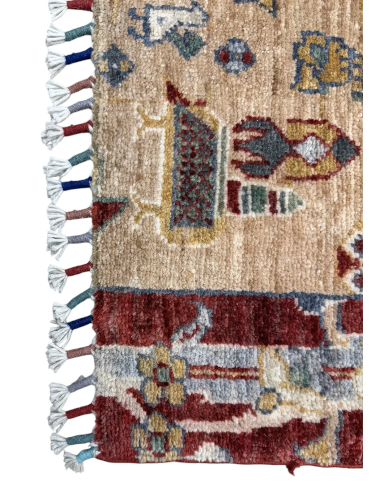 A colorful Kazak Extra rug adorned with traditional tribal patterns, showcasing a blend of vivid hues.