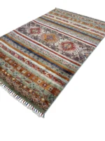 Colorful Kazak Extra rug adorned with unique tribal patterns, enhancing the aesthetic appeal of the interior.