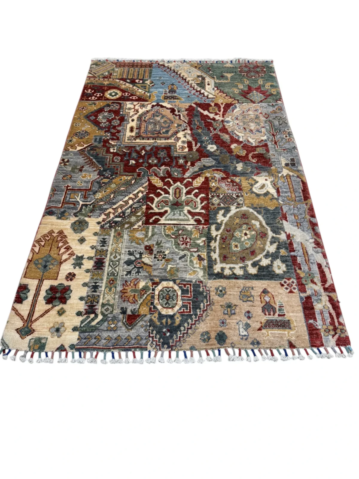 A distinctive Kazak Extra rug adorned with lively tribal motifs and rich colors.