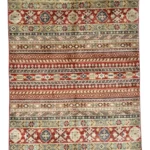 An exquisite Kazak rug featuring vibrant red, blue, and green hues, showcasing fine craftsmanship and beauty.