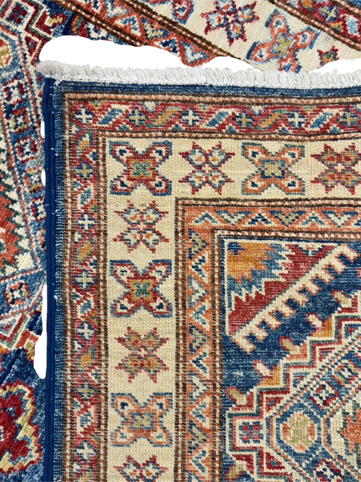 Tappeto Kazak Extra di alta qualità in lana blu e rosso, 138×80 cm, annodato a mano, ideale per salotto e ingresso.