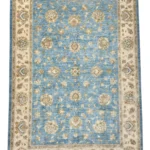 Scopri il tappeto Ziegler extra 302x205 cm, artigianale e resistente, con colori verdi e marroni per una casa raffinata.